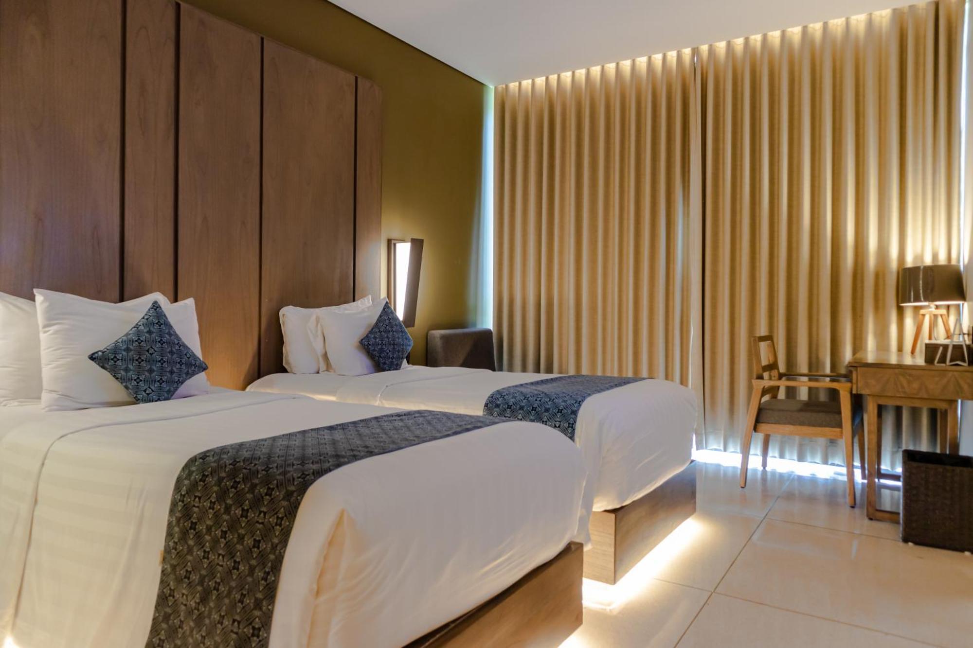 Wyndham Tamansari Jivva Resort Bali Siyut Ngoại thất bức ảnh Deluxe Room