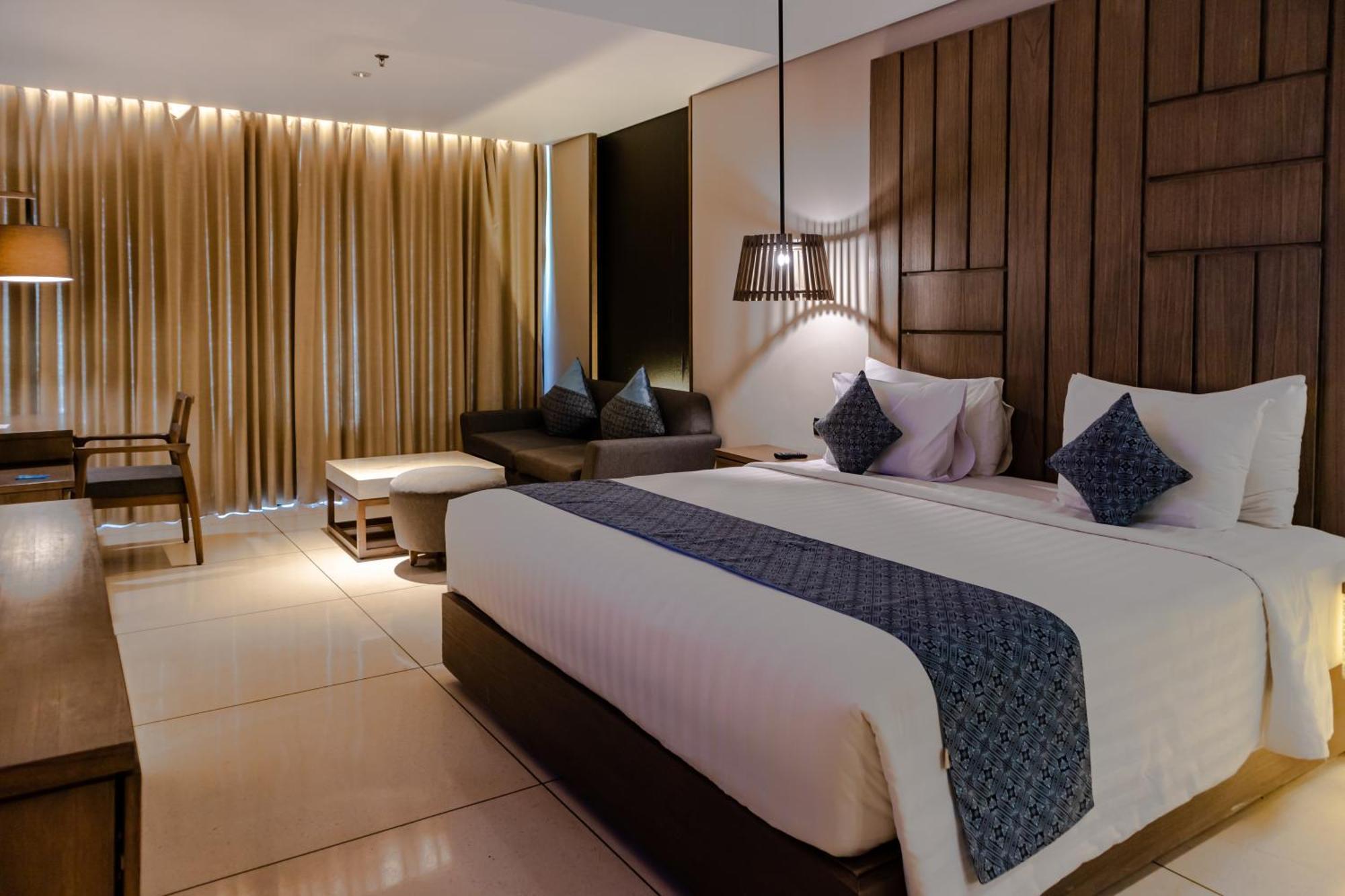 Wyndham Tamansari Jivva Resort Bali Siyut Ngoại thất bức ảnh Deluxe Room