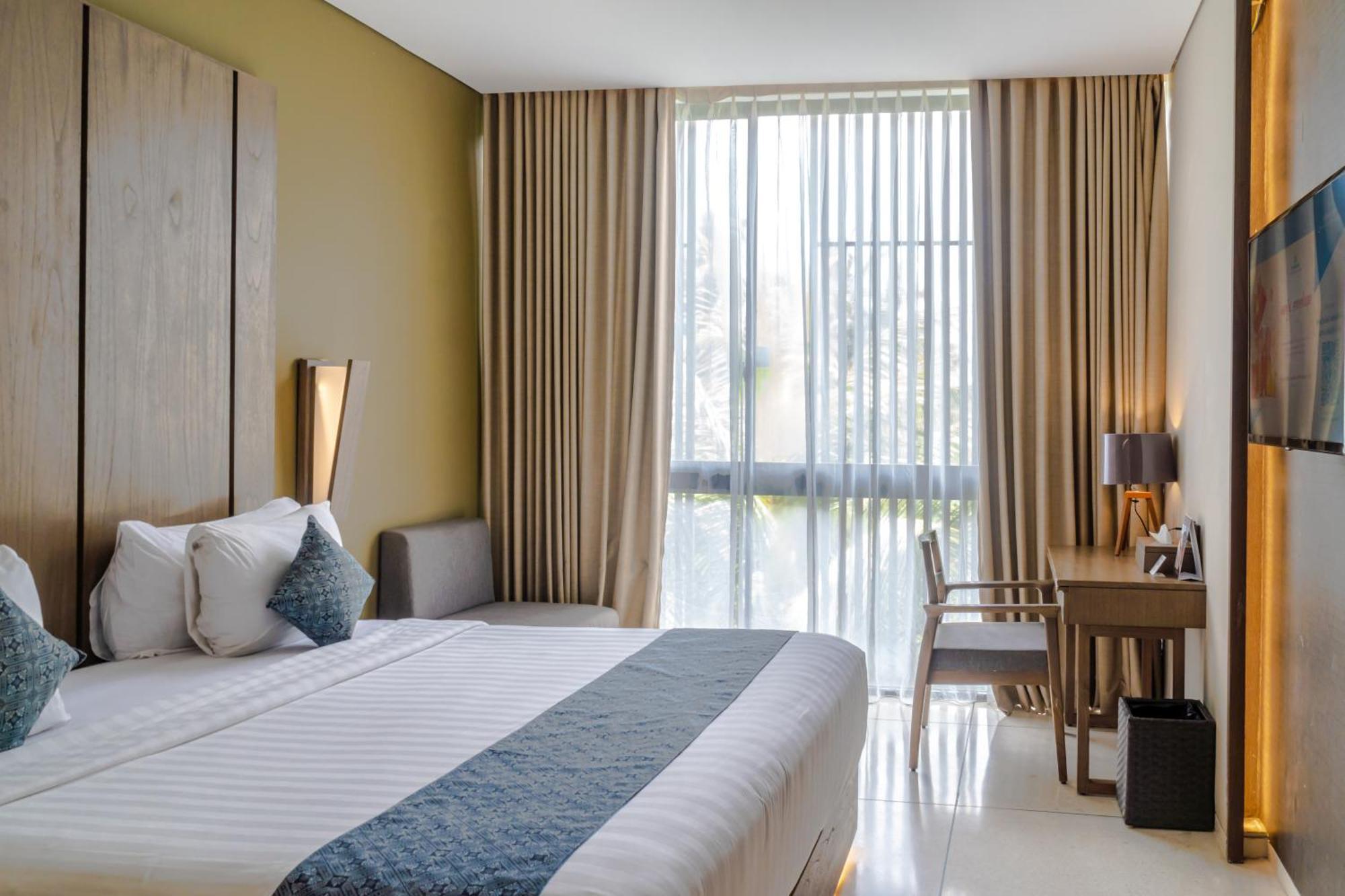 Wyndham Tamansari Jivva Resort Bali Siyut Ngoại thất bức ảnh Deluxe Room