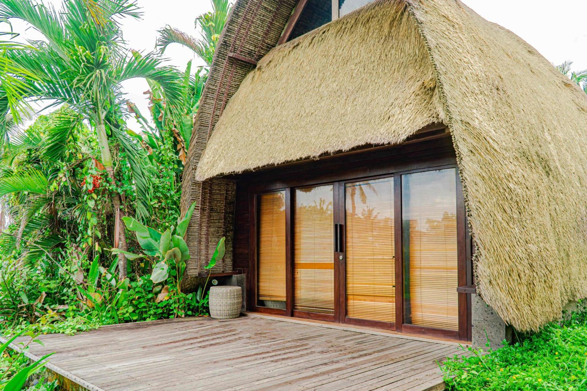 Wyndham Tamansari Jivva Resort Bali Siyut Ngoại thất bức ảnh A villa at the resort