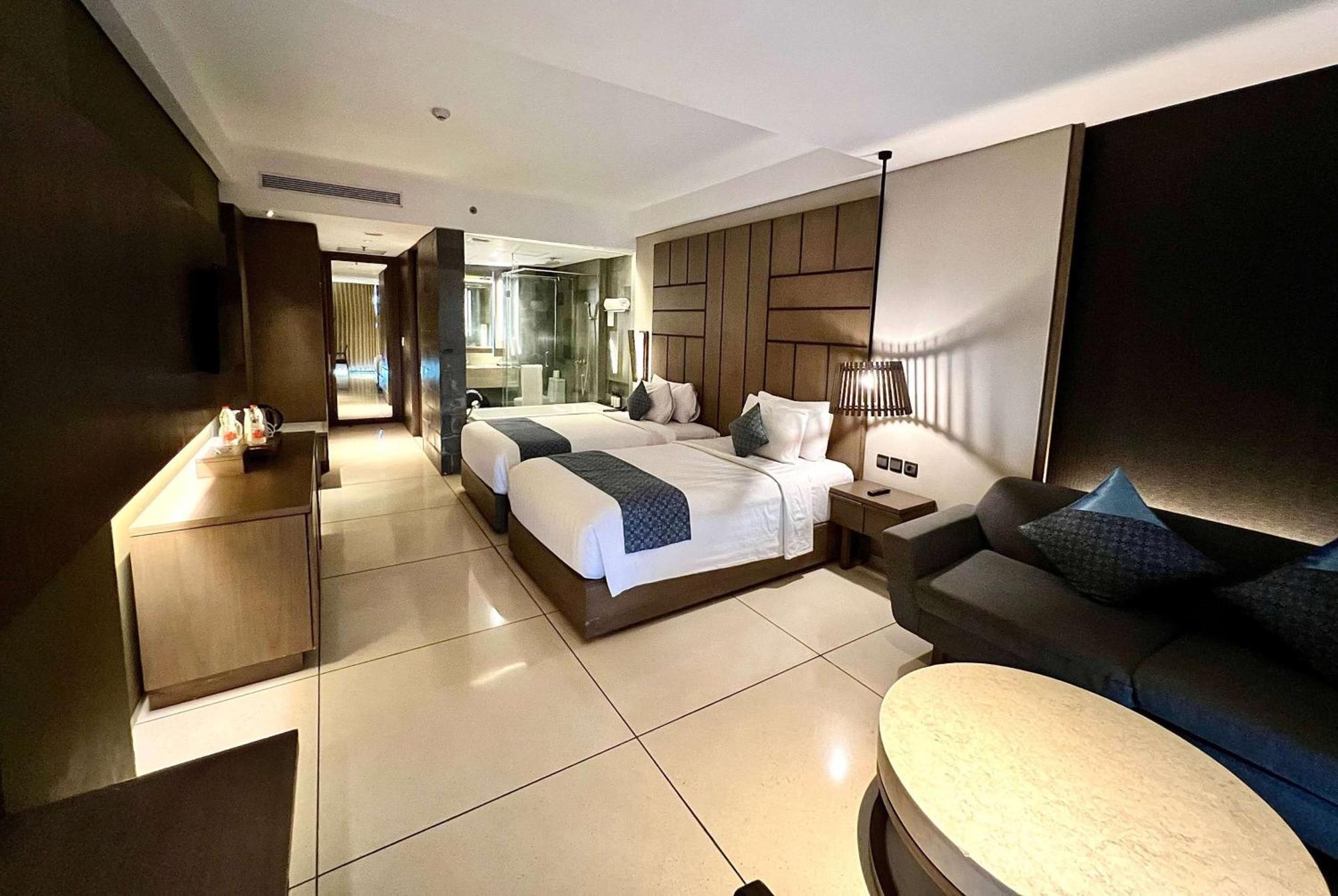 Wyndham Tamansari Jivva Resort Bali Siyut Ngoại thất bức ảnh Deluxe Room