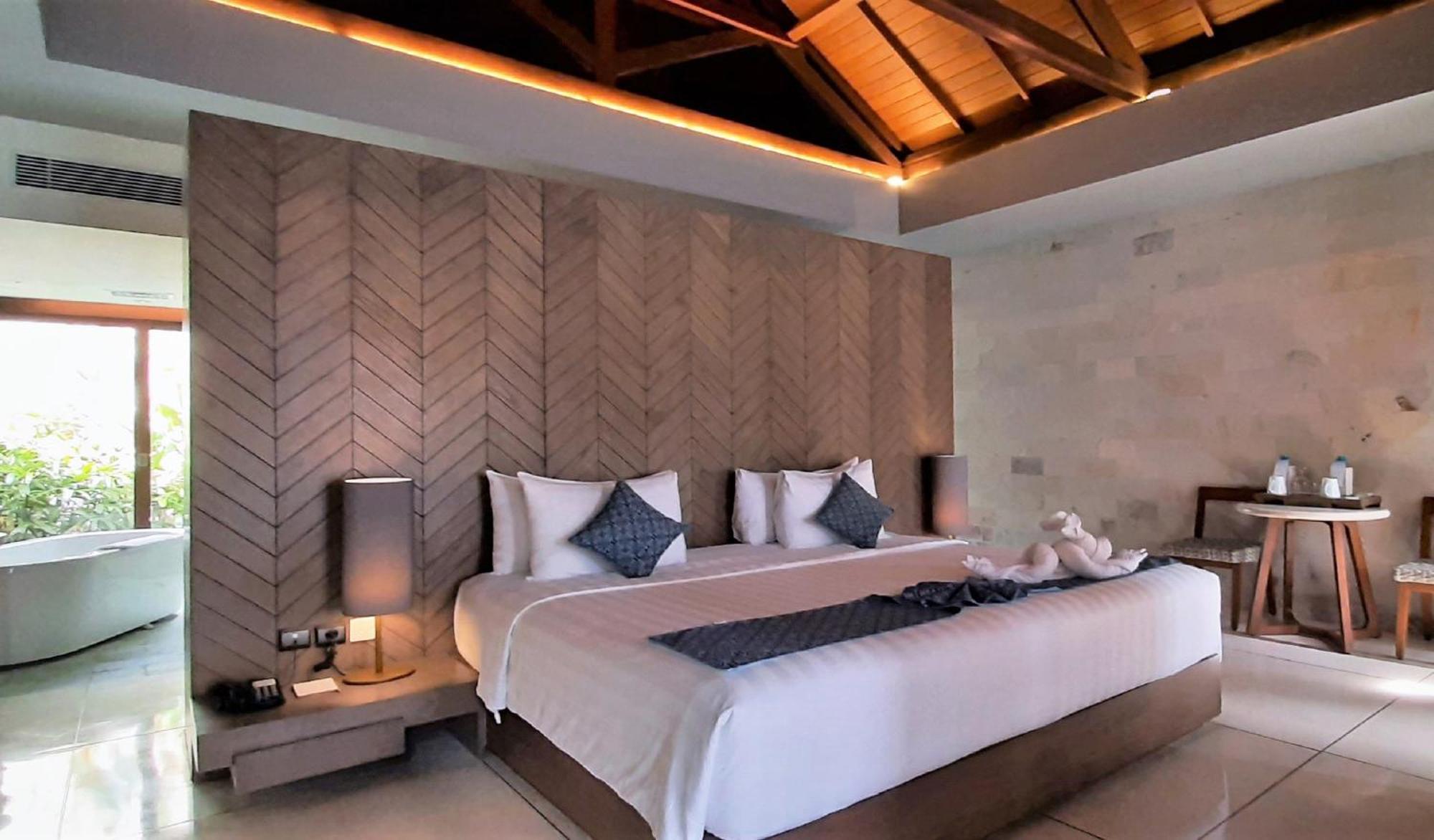 Wyndham Tamansari Jivva Resort Bali Siyut Ngoại thất bức ảnh A bedroom at the resort